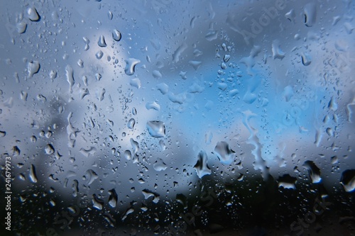 Water drop at window in rainy day