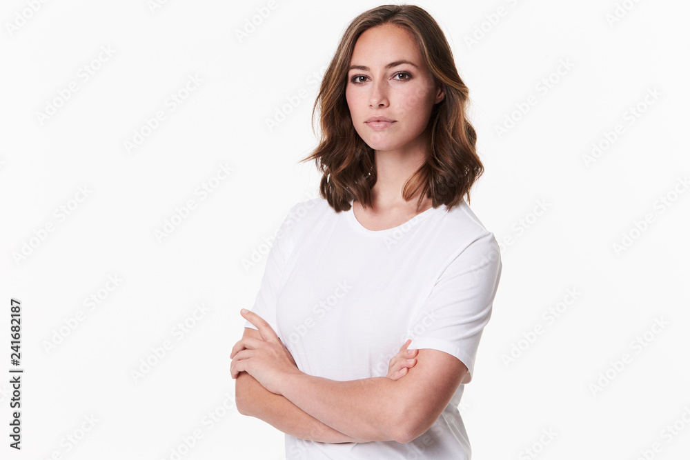 Seriously beautiful brunette in white t-shirt, portrait Seriously beautiful brunette in white t-shirt, portrait