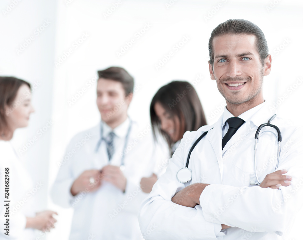 smiling doctor therapist on blurred background. smiling doctor therapist on blurred background.