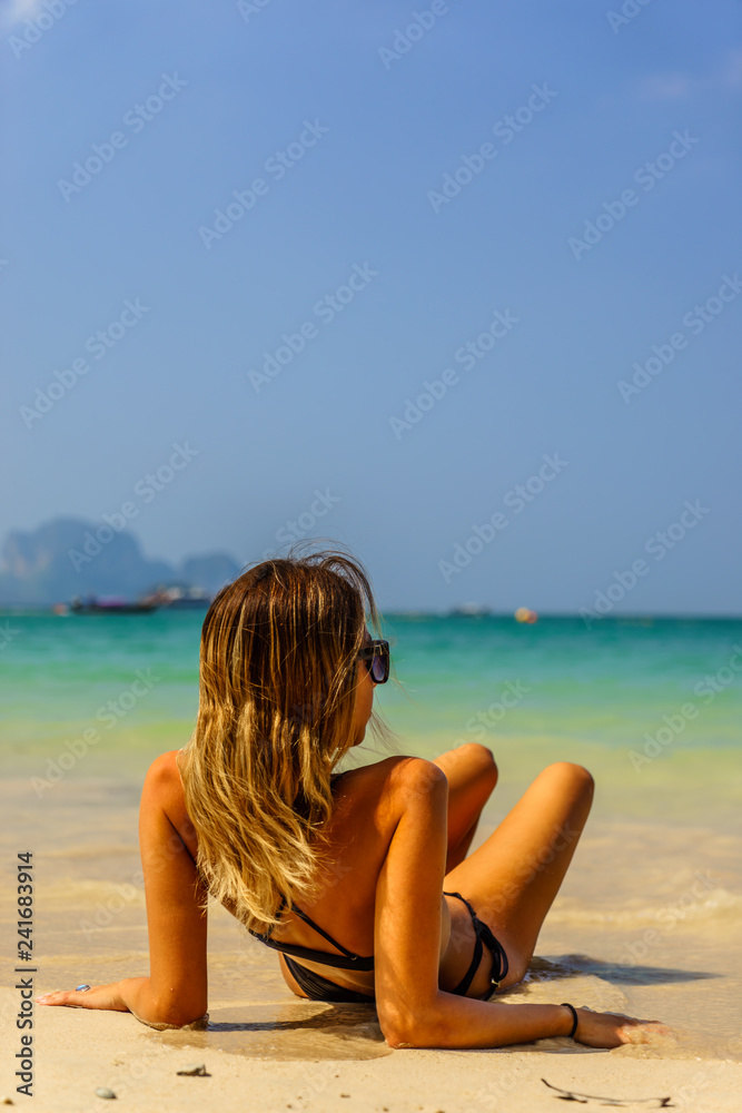 Woman on holidays at the beach