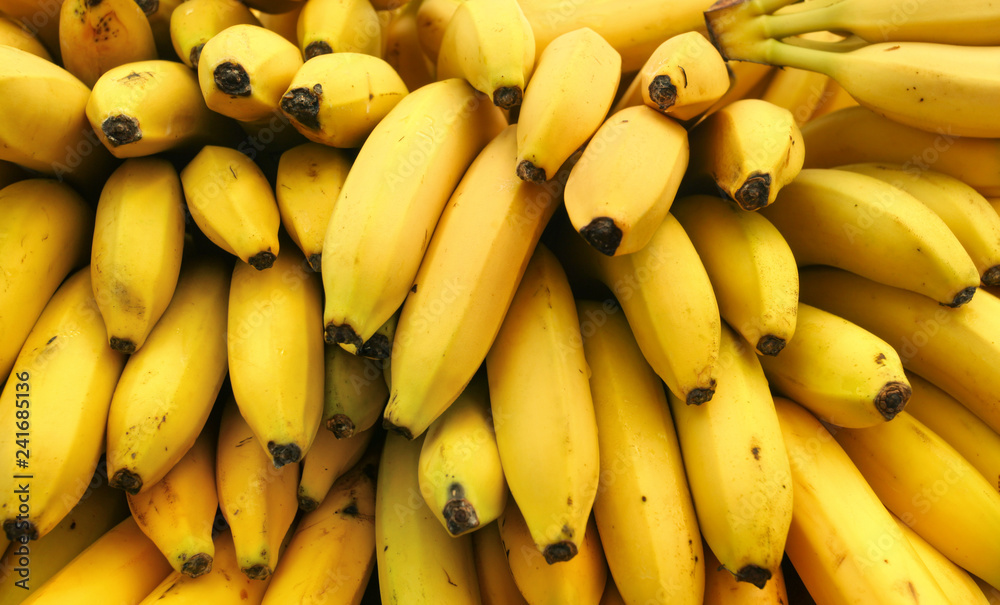 Bananas displayed on food market.