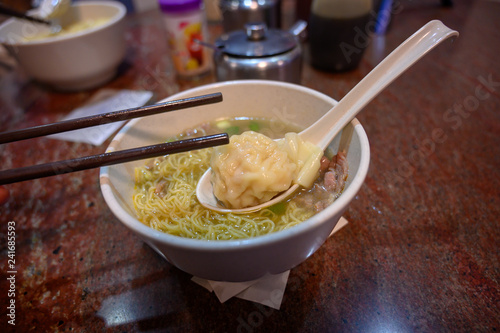 Photography egg noodle with shrimp wonton bowl of chicken soup hongkong food