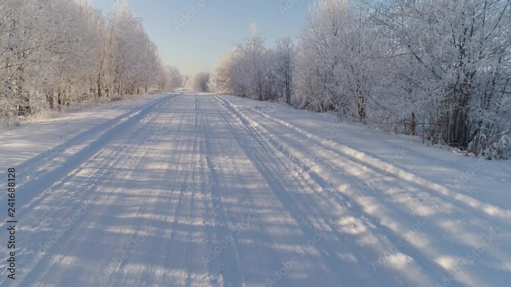 aerial view winter landscape with road and trees covered snow. winter in countryside aerial view winter landscape with road and trees covered snow. winter in countryside