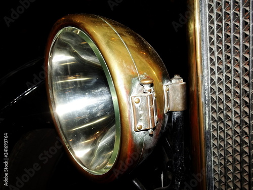 Slika na platnu Closeup of classic car headlamp