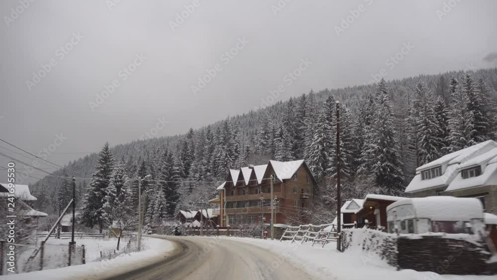 snowy mountain road moving along the road beautiful winter landscape snowy mountain road moving along the road beautiful winter landscape