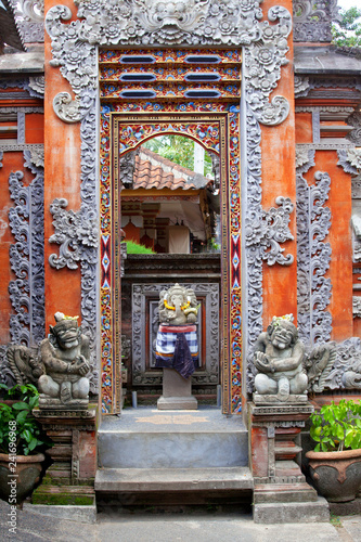 beautifu temple wood and stone decorative gate with traditional asian patterns and sculptures