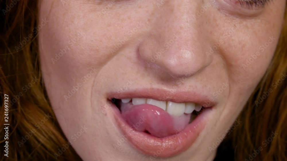 girl licks and kisses her lips girl licks and kisses her lips