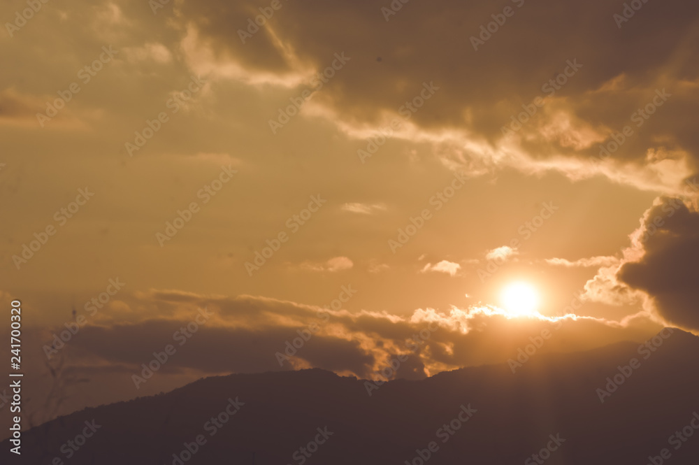 Gorgeous panorama scenic beauty of the sunset with colorful clouds on orange sky. Heavenly Sky background on Sunset and sunrise. Nature composition. Gorgeous panorama scenic beauty of the sunset with colorful clouds on orange sky. Heavenly Sky background on Sunset and sunrise. Nature composition.