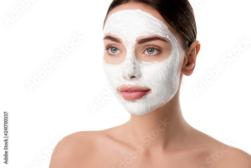beautiful woman with facial skin care mask isolated on white