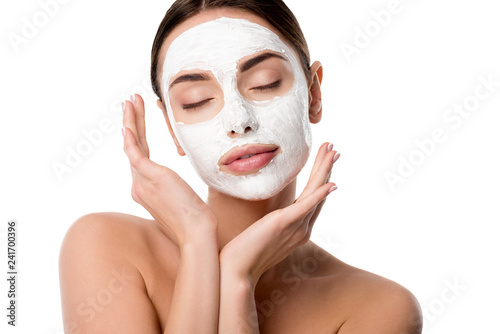 beautiful nude woman with facial skin care mask and eyes closed isolated on white