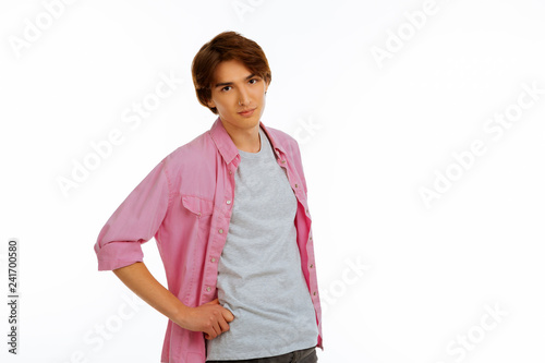Positive delighted young man wearing casual clothes