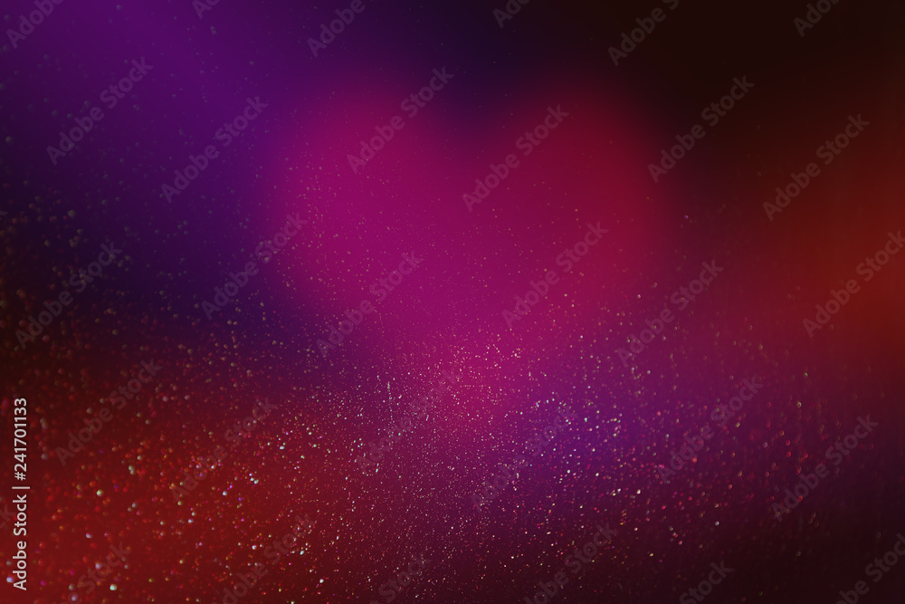 heart for valentines day in abstract red background with glowing stars and bokeh in the form of design decoration