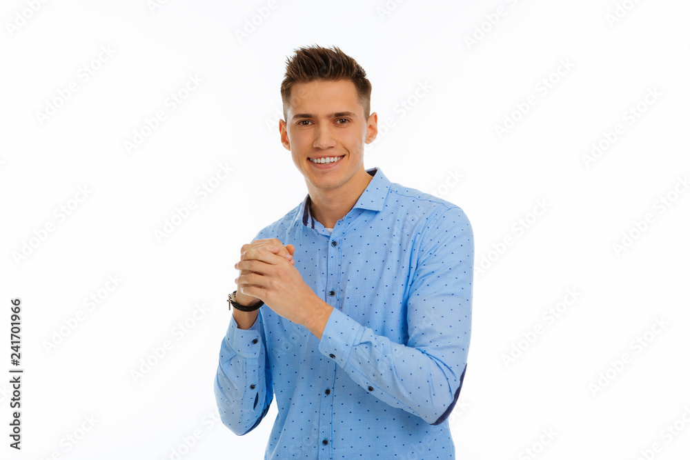 Delighted handsome man being in a wonderful mood Delighted handsome man being in a wonderful mood