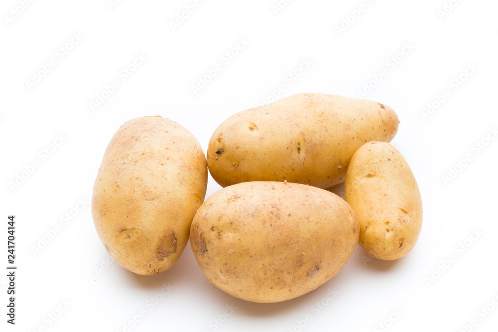New potato isolated on the white background. New potato isolated on the white background.
