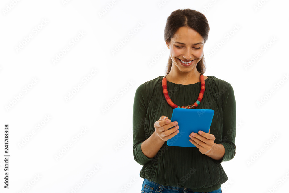 Positive nice young woman using social media Positive nice young woman using social media