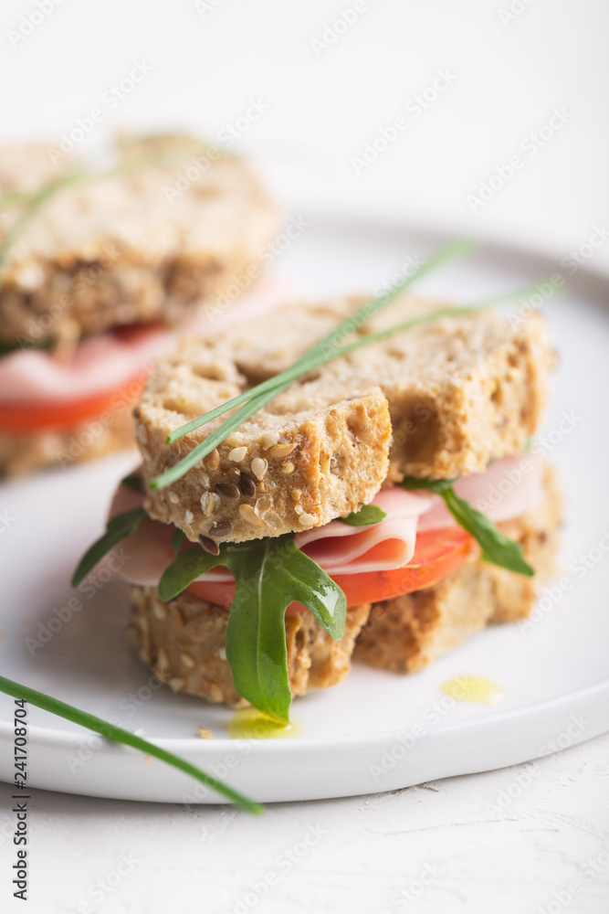 Homemade sandwiches prepared with fresh vegetables and olive oil