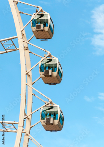 Ferris wheel turning in Andorra with the Pyrenees alond mountains