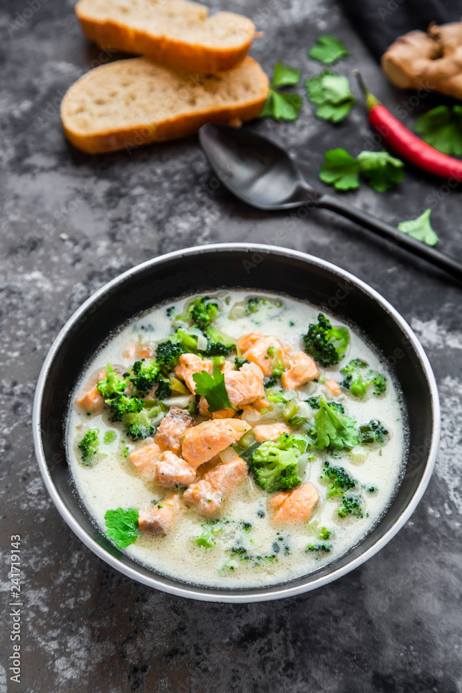 Cocos salmon soup, with broccoli, leek, coconut milk, parsley, chili pod, ginger and baguette Cocos salmon soup, with broccoli, leek, coconut milk, parsley, chili pod, ginger and baguette