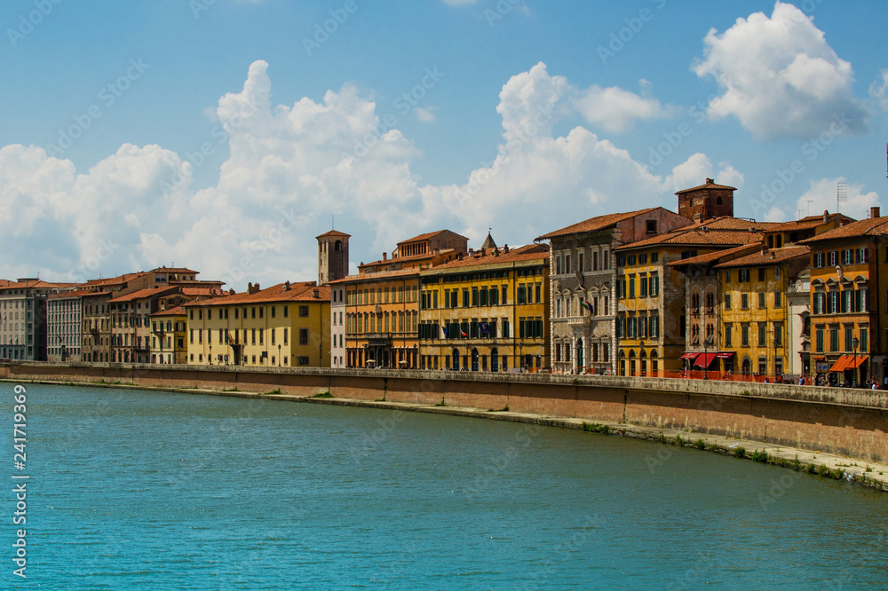 View on Arno River and houses in Pisa with clouds View on Arno River and houses in Pisa with clouds