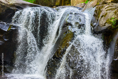 The image of the natural forest waterfall stream