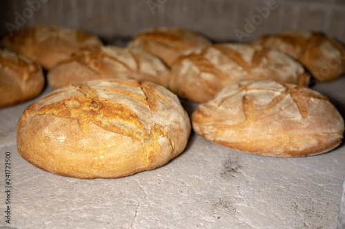 freshly baked bread in a wood oven, South Italy tradition