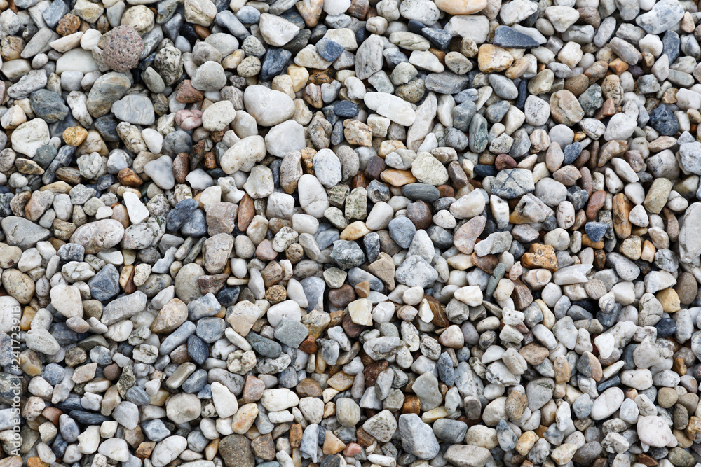 Close-up texture of colorful sea pebbles. Small Rock. Sea background