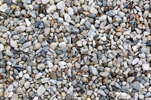 Close-up texture of colorful sea pebbles. Small Rock. Sea background