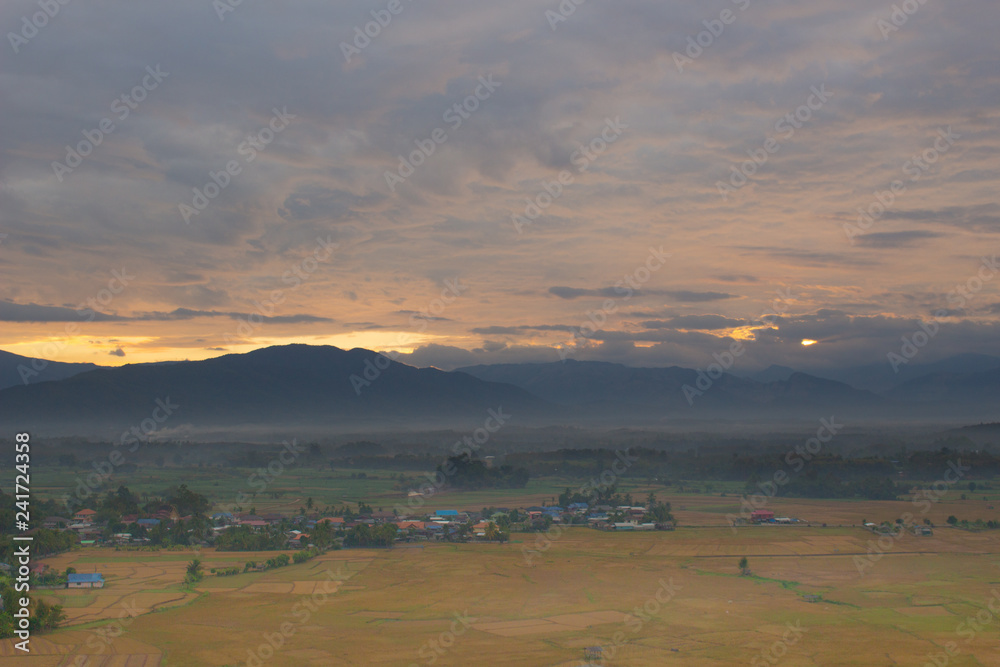 Sunrise with twilight from Nan province, Thailand. Sky, mountain soft and blur background.