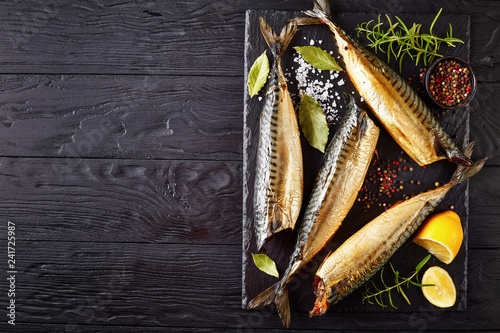 Photography Hot smoked mackerel on a black tray