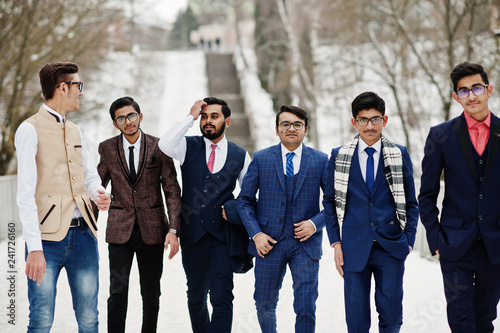 Group of six indian businessman in suits posed outdoor in winter day at Europe.