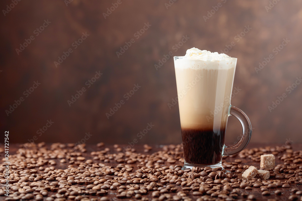 Coffee drink or cocktail with cream and pieces of brown sugar. Coffee drink or cocktail with cream and pieces of brown sugar.
