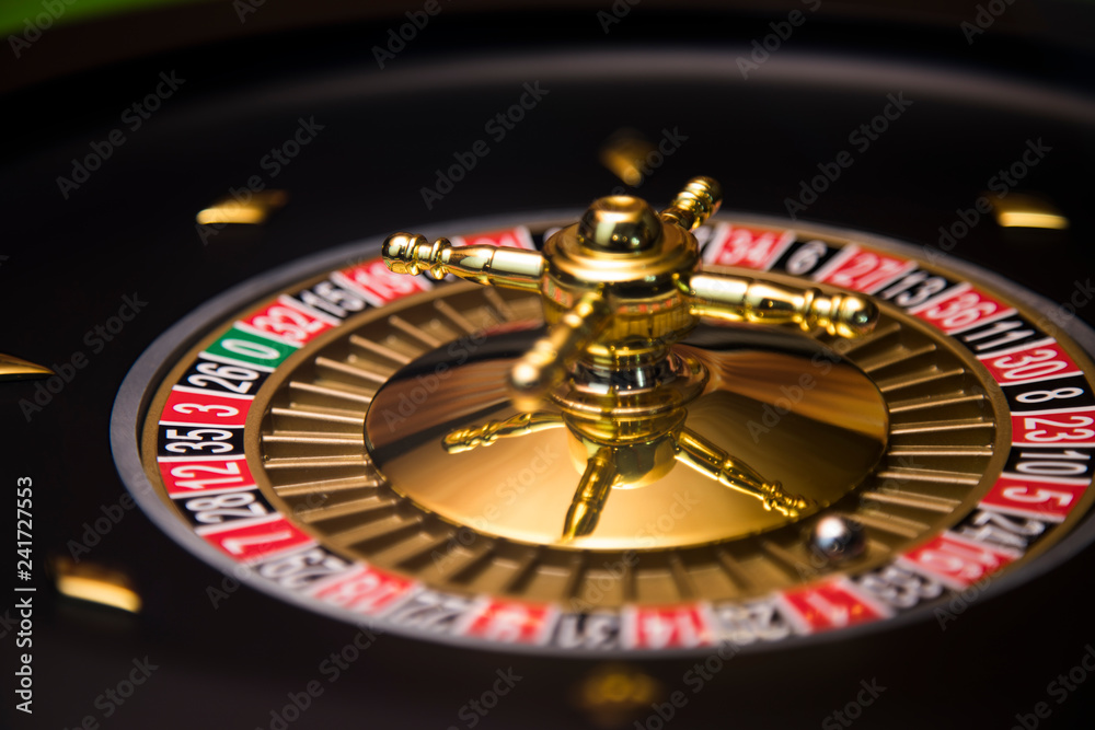 Roulette wheel running in a casino Roulette wheel running in a casino