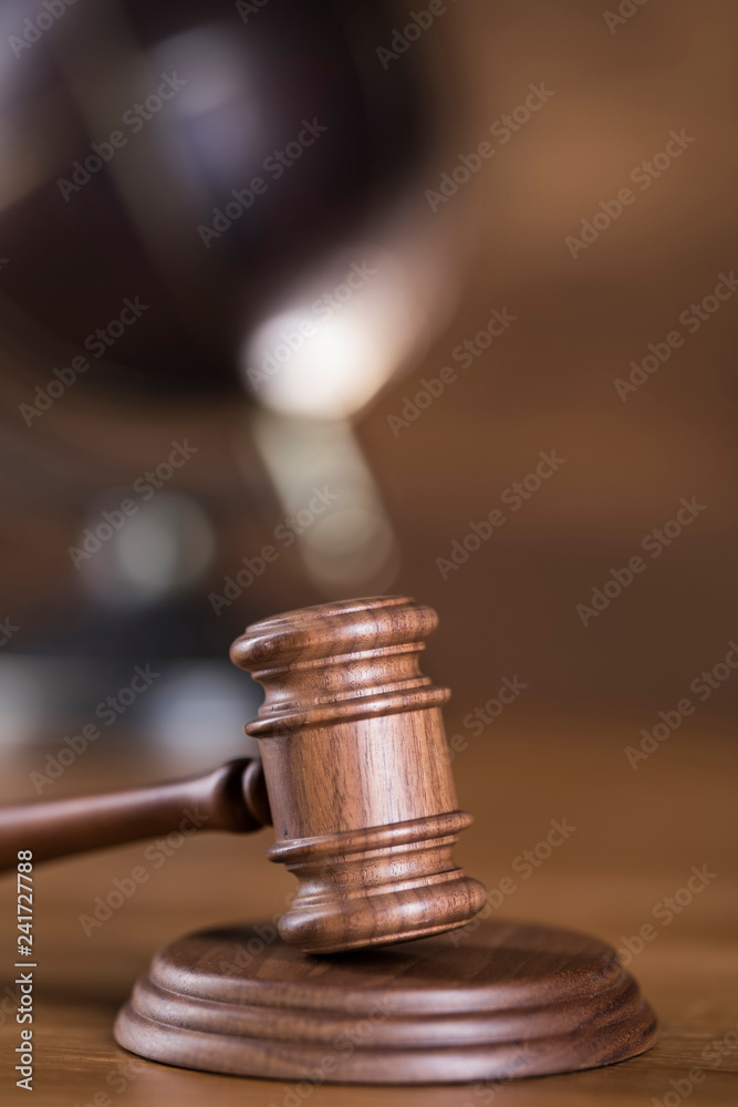 Globe, Law theme, mallet of judge, wooden gavel Globe, Law theme, mallet of judge, wooden gavel