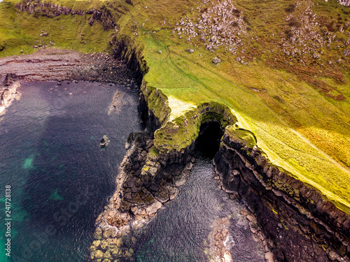 Aerial view of the Dinosaur bay with the rare Dinosaur footprint of the sauropod-dominated tracksite from Rubha nam Brathairean, Brothers Point - Isle of Skye, Scotland photo