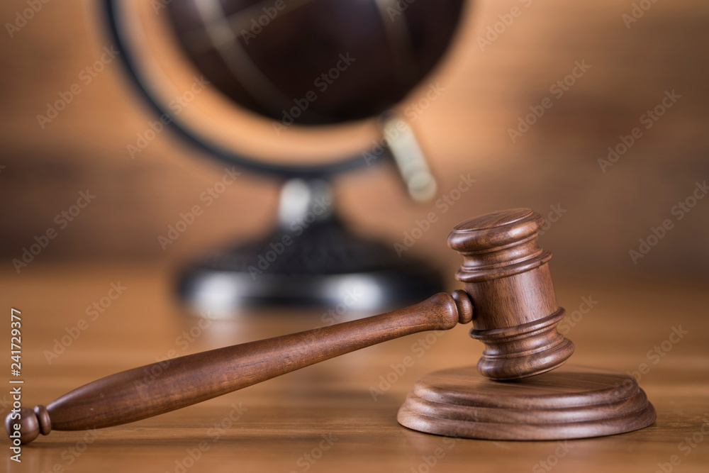 Globe, Law theme, mallet of judge, wooden gavel Globe, Law theme, mallet of judge, wooden gavel