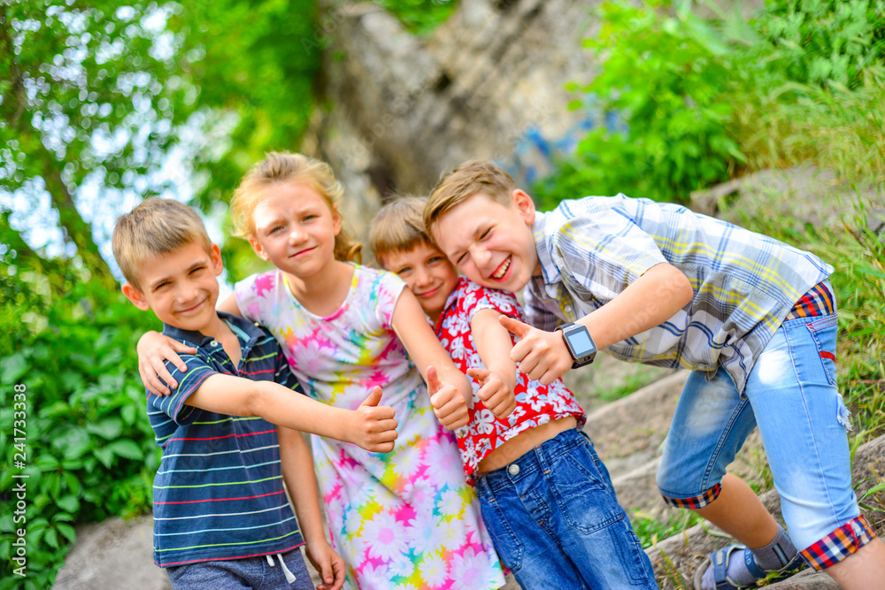 Joyful children playing in the park. Joyful children playing in the park.