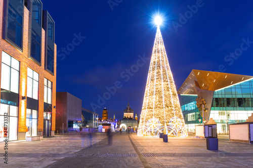 Architecture of the old town in Gdansk at dusk with christmas tree, Poland