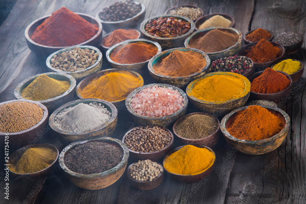 Aromatic spices on wooden background Aromatic spices on wooden background