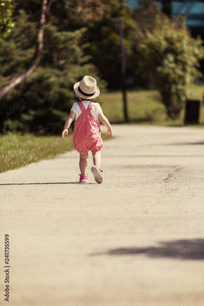 little girl runing in the summer Park little girl runing in the summer Park
