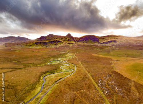 Aerial view of the River Lealt and Single track at Loch Cuithir and Sgurr a Mhadaidh Ruadh - Hill of the Red Fox, Isle of Skye, Scotland photo