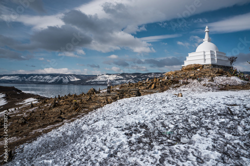 Buddhist stupa on an island in the Baikal lake in winter