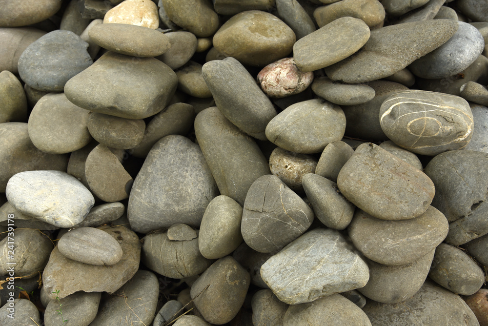 background of large gray cobblestones background of large gray cobblestones