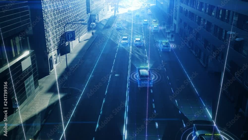Aerial Drone Shot: Autonomous Self Driving Cars Moving Through City. Concept: Artificial Intelligence Scans Cars and Pedestrians, Following Movement and Showing Data.