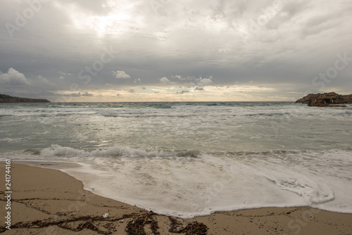 Fototapeta Naklejka Na Ścianę i Meble -  Cove in San Antonio de Ibiza a cloudy day