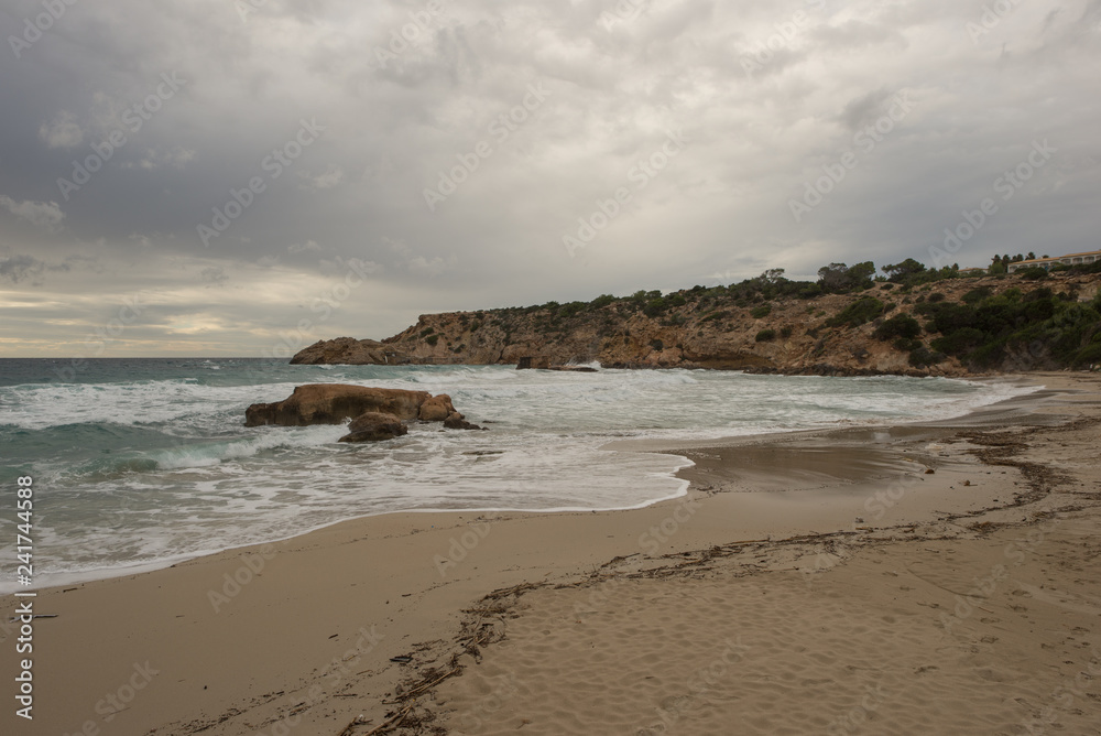 Cove in San Antonio de Ibiza a cloudy day
