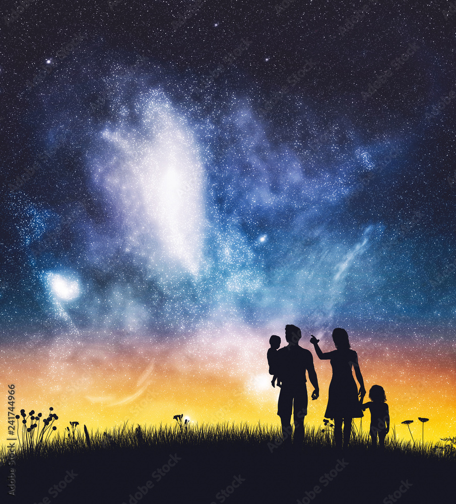 Parents with their children on a night sky.