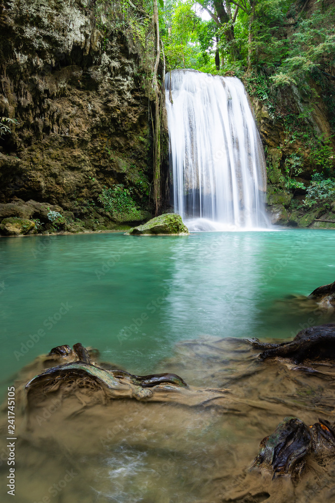 Fototapeta premium Erawan Falls (The third waterfall – Pha Nam Tok) with emerald green pond in Erawan National Park.
