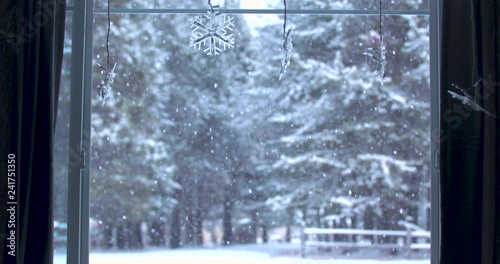 Snowfall Through a Window