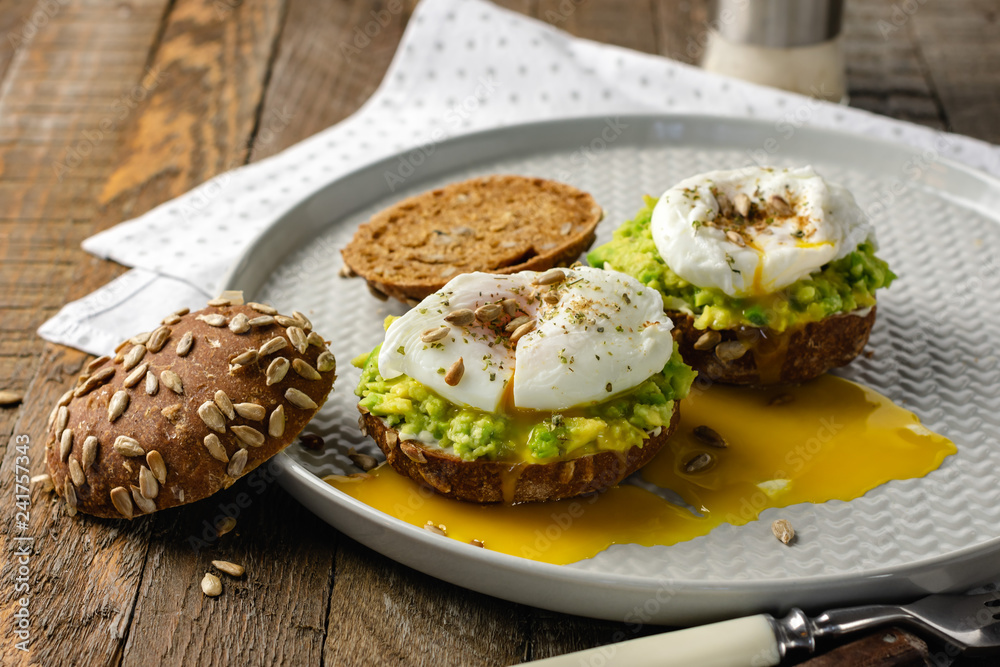 Sandwiches with avocado and poached egg.