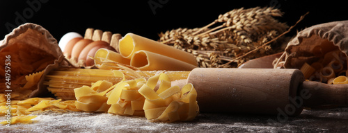 pasta. Fresh homemade pasta with pasta ingredients on the rustic table.